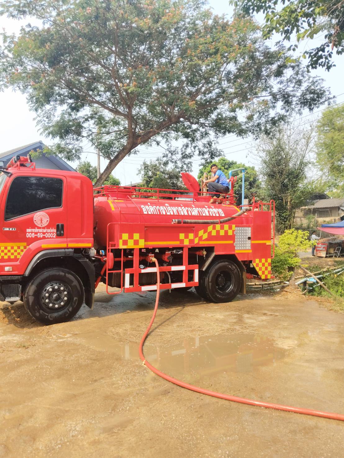 ฉีดล้างลานอเนกประสงค์ บ้านแม่สุขใน หมู่ 4 ตำบลวังซ้าย