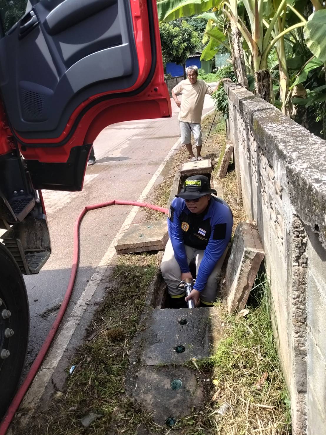 ฉีดล้างรางระบายน้ำ หมู่ที่ 2